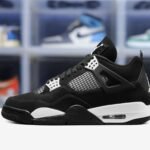 2_left-Air Jordan 4 Retro White Thunder.jpeg