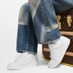 louis-vuitton-lv-trainer-sneaker--BSUPMUGC01_PM1_Cropped-worn-view.jpeg