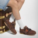 louis-vuitton-lv-trainer-sneaker--BSUPMYNU92_PM1_Cropped-worn-view.jpeg